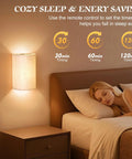 Cozy bedroom featuring Wireless Rechargeable Wall Sconces Set Of Two Featuring 16 RGB hues and three warm tones.