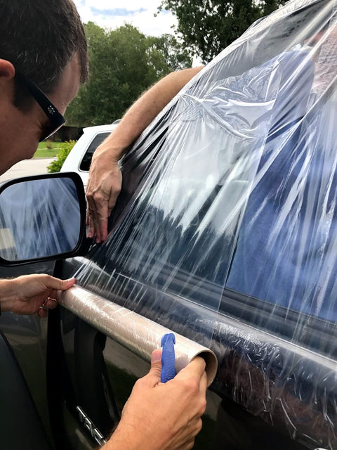 Applying Car Window Repair Tape Wrap 17.5 Inch Wide Clear Adhesive Film 6 Ft Long Waterproof Tacky Tape on car window