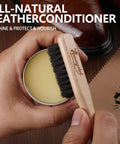 Premium Eleven Piece Leather Care Kit With Horsehair Brushes Rich Saddle Soap Conditioning Mink Oil Waterproofing Wax Soft Polishing Cloths And Microfiber Pads showing hand holding horsehair brush over leather conditioner.