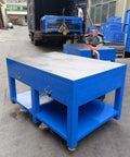 Rock Solid No Nonsense Heavy Duty Workbench For Welding And Metal Fabrication With 8mm Thickened Steel Plate in blue color.