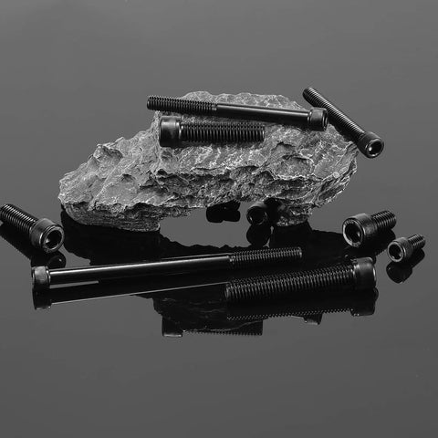 10 Piece 3/8-16 X 1-1/2 Inch Socket Head Cap Screws Crafted From Rugged 18-8 304 Stainless Steel For Heavy Duty Grit And No Sweat Rust Defense Featuring A Matte Black Oxide Shell And Full Thread Engagement Sweet For Weekend Crews And Homebase Builds With on a rocky surface.
