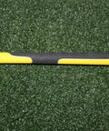 True Flex Swing Tempo Trainer grip detail with yellow handle, durable polyurethane head, 46-inch shaft for golfers to flatten swing plane.