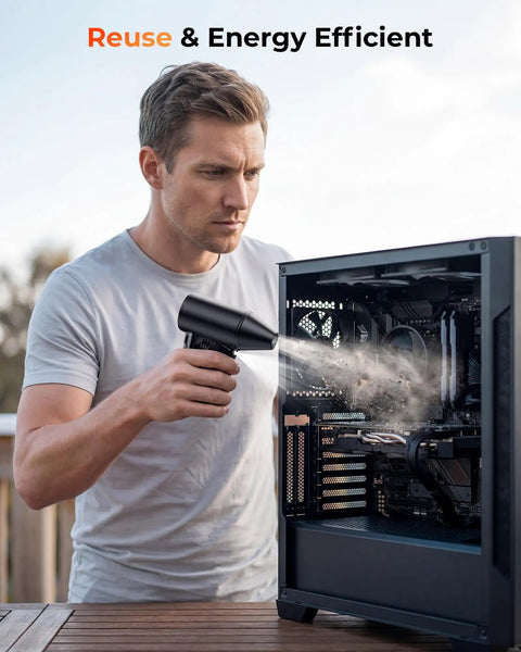 Man using Powerful High Speed 110000 RPM Electric Air Duster With Brushless Motor to clean a PC, emphasizing reuse and energy efficiency.