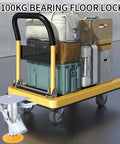 Heavy Duty Floor Lock Brake With Adjustable Height Manganese Steel Cart Lock For Trolleys, 100kg Load Capacity, TPU Pad, Fits 4 To 5 Inch Casters, Secure Stop For Industrial Carts And Dollies, shown securing a loaded trolley