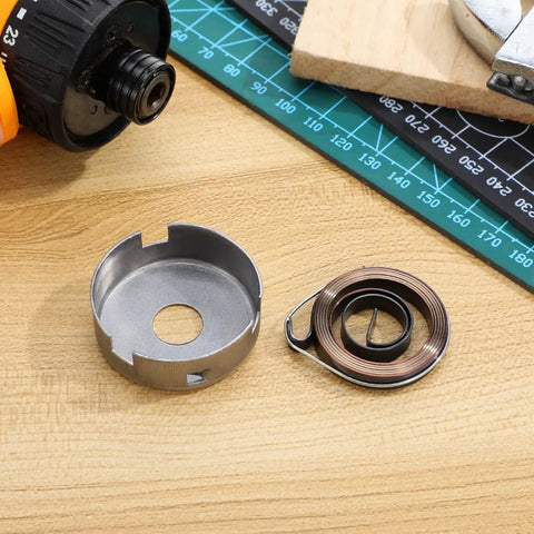 No Fuss Drill Press Return Spring Assembly With Sleeve Heavy Duty Quill Feed Coil Spring Upgrade For Bench Machine Repair, parts on wooden surface.