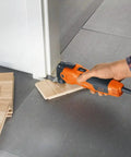 Beast Of An Oscillating Tool Kit For Interior Renovation With 350W Motor used to cut wood flooring near doorframe