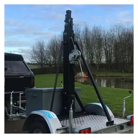 Heavy Duty 9 Meter Manual Winch Telescopic Mast With A Sturdy 70kg Load Rating For Off Grid Satellite Antennas setup on trailer.
