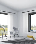 Room with large windows using Five Eighth Inch Matte Black Heavy Duty Stainless Steel Curtain Rods You Can Extend From 48 To 92 Inches