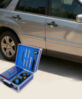Portable Electric Dent Repair Kit With 1380W Paintless Dent Puller And 110V US Plug Induction Heater next to a car