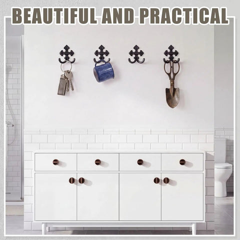 Built Like A Tank 8 Pack Double Wall Hooks Heavy Duty Wrought Iron Cast Iron Vintage Hangers Decorative Coat Towel Key Holder With Installation Hardware For Home Garage Shed Storage Solutions on a wall.