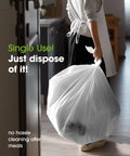 Heavy Duty White Disposable Tablecloths 8 Pack 54 By 108 Inches being carried in a kitchen for easy cleanup after meals.