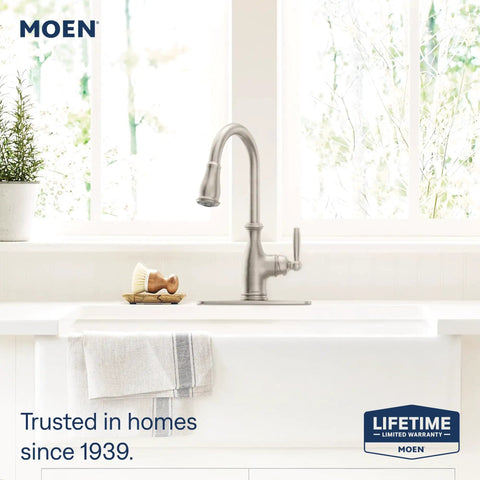 Traditional One Handle Kitchen Faucet In Spot Resist Stainless With Pull Down Sprayer Power Boost Quick Rinse Reflex Retractable Hose Dead Simple Install Slick Steel For Everyday Upgrades in a bright kitchen setting