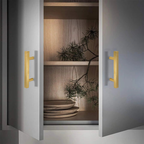 Gold Stainless Steel Cabinet Pulls Square Drawer Handles Set Of 2 127 Mm Long 12 Mm Wide installed on a kitchen cupboard