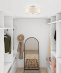 Meridian 3 Light Ceiling Mount Fixture in brushed nickel with oatmeal fabric drum shade in a modern organized closet