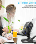 USB Clip On Desk Fan With Sturdy Clamp Tiny But Mighty Portable Personal Fan in office setting on desk near drinks