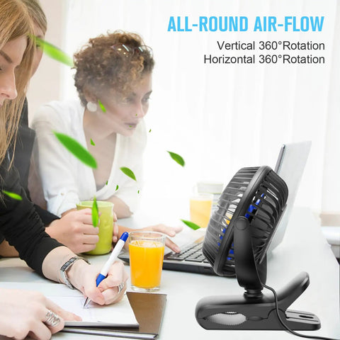 USB Clip On Desk Fan With Sturdy Clamp Tiny But Mighty Portable Personal Fan in office setting on desk near drinks