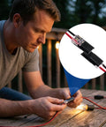 Man installing 60 Pcs Quick Clip Wire Connectors Set for 18 To 22 AWG Low Voltage LED Strips, shown in use on outdoor wiring.