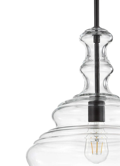 Close-up of oil rubbed bronze modern LED pendant light with clear glass shade, adjustable for kitchen island, dining room.