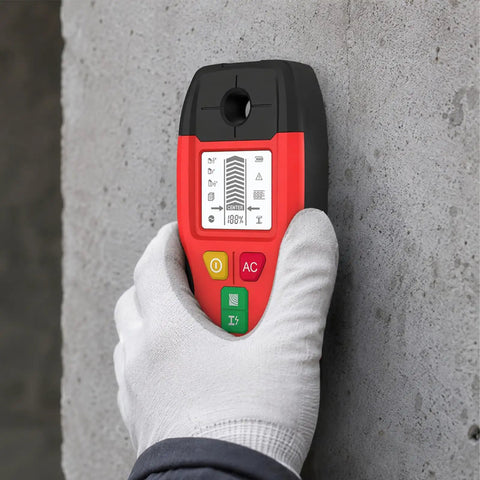 6-in-1 Stud Finder Wall Scanner Magnetic Metal Detector LCD(Red) being used against a concrete wall, showing LCD display.