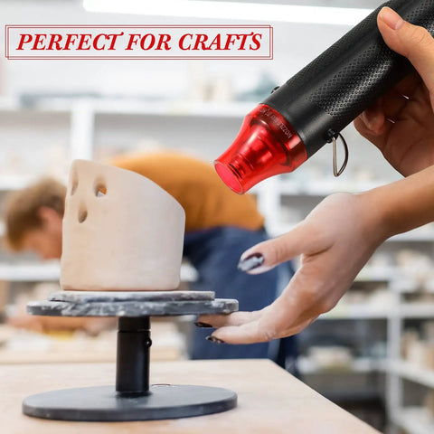 Compact 3 Pack Heat Gun Hot Air Tool For Crafting And Epoxy Resin Projects Fast Heating Blower For vinyl wrap and paint drying, handheld tool in use.