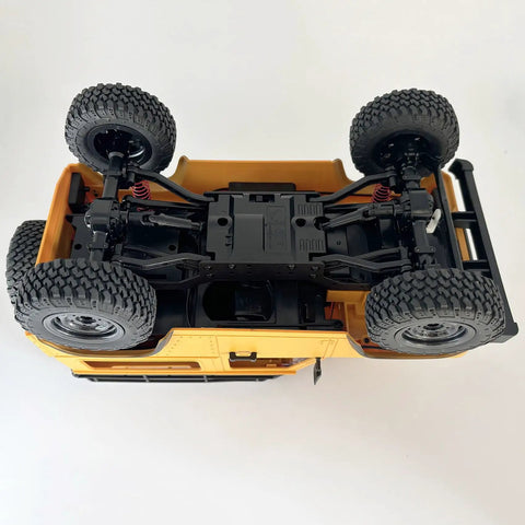 Underside view of One Twelfth RC Crawler MN98 Remote Control Truck Off Road Four By Four Land Rover Defender Style chassis