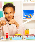 Student using 8 Piece Lamp Socket Science Experiment Kit for DIY Light Bulb Holders and Electromagnet Projects Basic Electricity Hands On Learning Tool for Students and Home Makers Great For Classrooms and Home Science Labs in a classroom setting.
