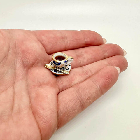 Close-up of miniature teacup hinge head from Six Pack Tea Cup Door Hinge Heads Decorative Toppers Set For Unique Home Kitchen Decor