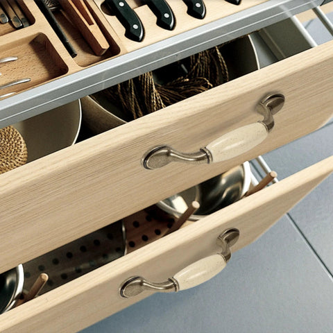 Open drawer showing Eight Piece Ceramic Drawer Handles Set In Chinese Style With Vintage Antique Design for cabinets and cupboards.