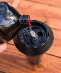 Pouring Mosquito Repellent Torch Fuel Duo Pack 100 Oz Citronella Cedar Formula For Outdoor Mosquito Control into ground torch