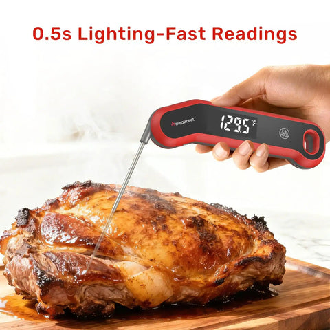 Instant Read Digital Meat Thermometer with lightning fast 0.5 second response inserted in roasted meat, showing 129.5°F
