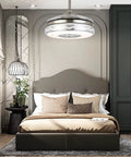 Retractable Ceiling Fan With Lights Bluetooth Speaker And Chandelier Remote Control Dope 42 Inch Silver in bedroom setting.