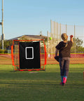 Child pitching towards Backstop 4Ft By 6Ft Batting Cage Target Backdrop With Strike Zone For Baseball Softball Pitching Target Net