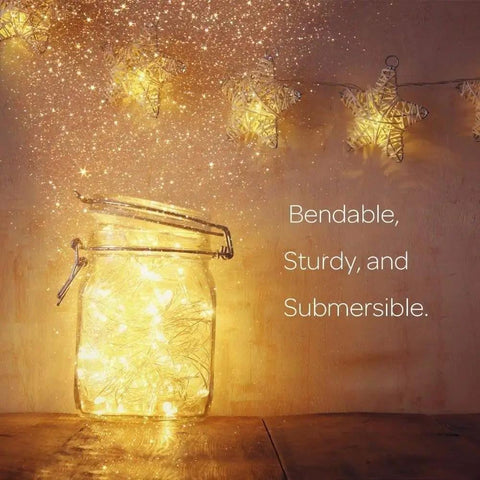 Battery Operated Fairy String Lights 10 Feet With 30 Warm White LEDs in a jar, star-shaped lights, text on bendable and submersible features.