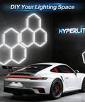 Gen 2 Hexagon Garage LED Light With 3 Level Dimmable Power 168W 16800LM installed in car showroom with white sports car