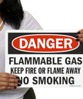 Rock Solid Heavy Duty Aluminum Danger Flammable Gas No Smoking Safety Sign 10 By 14 Inches held in hands, clear warning message.
