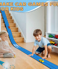 Children playing on Race Car Track Starter Set With Flexible 15 Foot Ramp, Portable Ramp Track System, indoors with toy cars