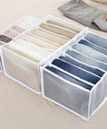 Wardrobe Upgrade Alert Killer 7 Grid Pants Organizer Box For Closet Drawer Sorter with seven compartments holding folded pants