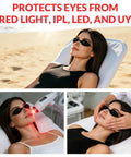 Straight Up The Best Red Light Therapy Glasses With Half Clear Lenses Offer Top Shelf Eye Protection For Tanning Beds By Blocking UV And Infrared Waves While Giving You Solid Coverage And Zero Fuss During Every Session, worn by a woman for laser treatment.