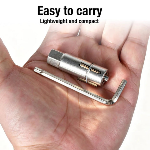 Super Tough Heavy Duty Forged Steel Thread Retapper And Broken Bolt Extractor in hand, lightweight and compact for plumbing repairs.