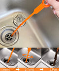 Person using 7 In 1 Hair Drain Clog Remover Tool Kit For Bathroom Tub Toilet Kitchen Sinks, DIY Easy Hair Debris Removal And Drain Cleaning.
