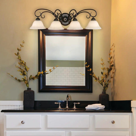 Homestead Bath Fixture In Rubbed Bronze With Tea Stone Glass 32W X 9H X 10D above mirror in cozy eclectic bathroom