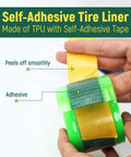Close-up of hands unrolling Self-Adhesive Fat Bike Tire Liner TPU Puncture Protector, showcasing adhesive tape properties.