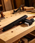 Beefy T Slot Stop Block 80 By 10 Mm With 25 Mm Slider Hand Tightening Fence Stops for woodworking setup on wooden workbench.