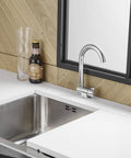 Premium RV Sink Faucet with Spotless Chrome Finish Heavy Duty 360 Swivel Marine Cold Water Tap Compact Deck Mount Setup with sink and counter.