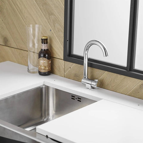 Premium RV Sink Faucet with Spotless Chrome Finish Heavy Duty 360 Swivel Marine Cold Water Tap Compact Deck Mount Setup with sink and counter.