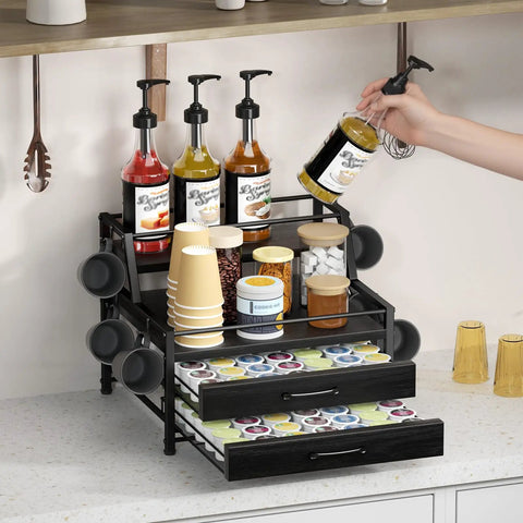Black 4 Tier Coffee Syrup Rack Organizer with Room for 8 Syrup Bottles and 84 Coffee Pods on Countertop
