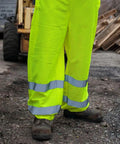 Straight Up The Ultimate High Visibility Reflective Safety Pants For Men And Women Featuring Cool Airflow Mesh For Sweltering Construction Grinds And Traffic Work All Day No Sweat Ease, showcasing bright yellow mesh fabric.