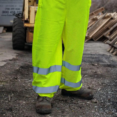 Straight Up The Ultimate High Visibility Reflective Safety Pants For Men And Women Featuring Cool Airflow Mesh For Sweltering Construction Grinds And Traffic Work All Day No Sweat Ease, showcasing bright yellow mesh fabric.