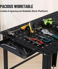 Beefy Heavy Duty 36x24 Welding Table With Five Eighth Inch Tool Holes And Adjustable Legs with tools on surface