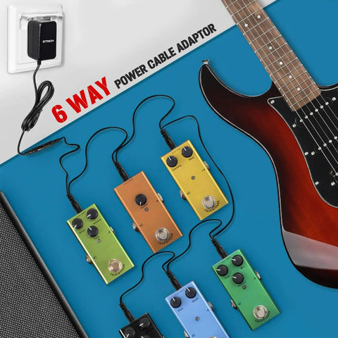 Image of 6 Way Daisy Chain Guitar Pedal Power Supply For Pedalboard 9V DC 1A Output With Noise Isolation And 9W Rating, showing six pedals connected to power adapter.
